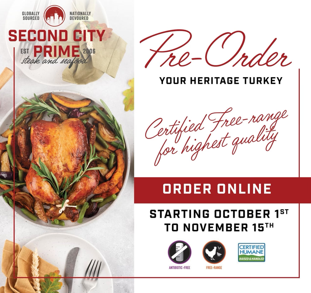 Well-cooked heritage turkey with herbs displayed beautifully on a platter.