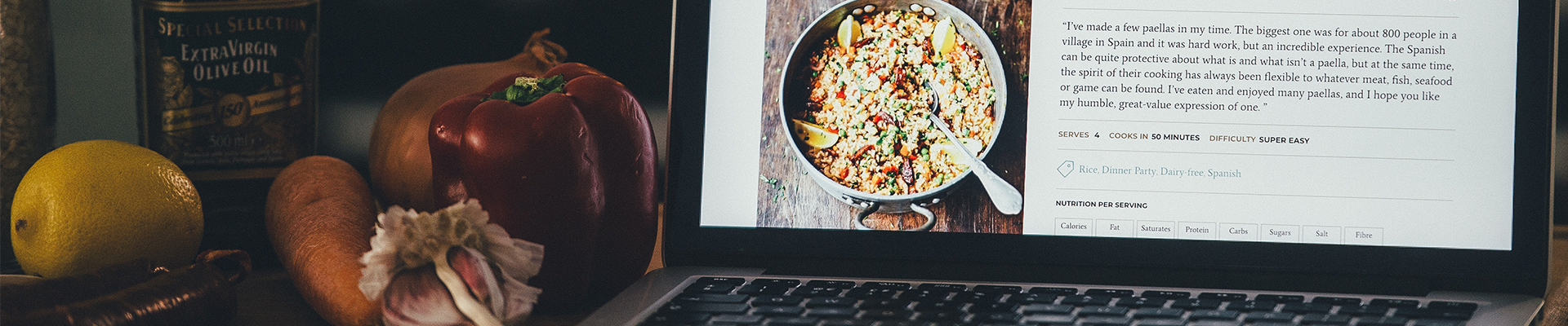 Image of cooking ingredients and tablet displaying recipe instructions.