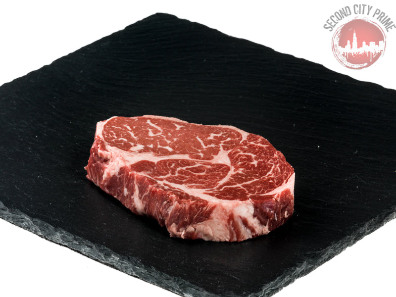 USDA Prime Dry Aged Boneless Ribeye (10oz) – Second City Prime Steak and  Seafood