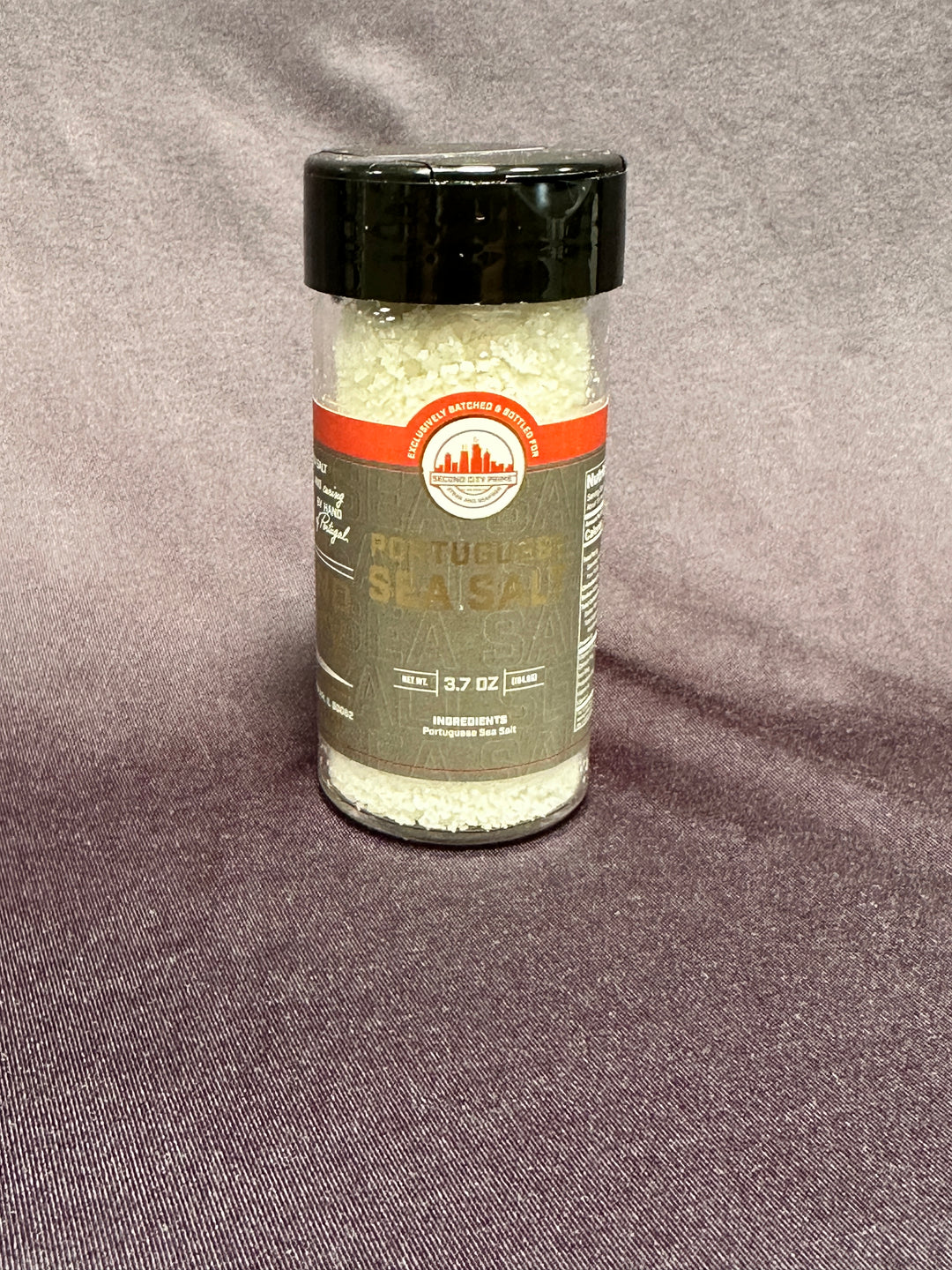 Jar of Portuguese Fleur de Sel Sea Salt, 3.7oz. A natural sea salt perfect for seasoning and finishing dishes.