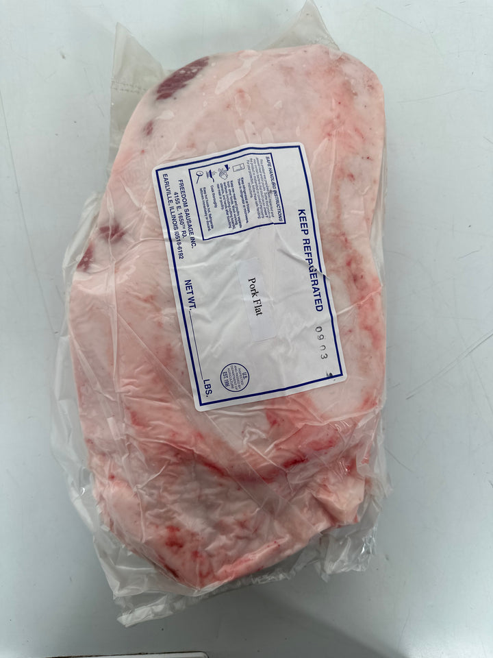 Raw Mangalitsa pork flat, a marbled cut of meat known for its rich flavor.