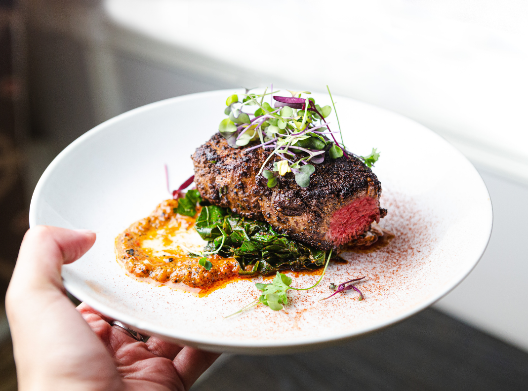 Bison Filet with Micro Kale, Sauteed Collards, and Red Pepper Puree