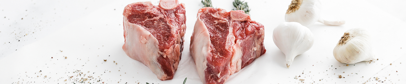 Raw Second City Prime lamb with herbs and garlic.