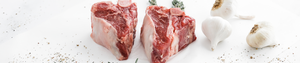 Raw Second City Prime lamb with herbs and garlic.