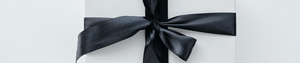 Gift card with a black bow.