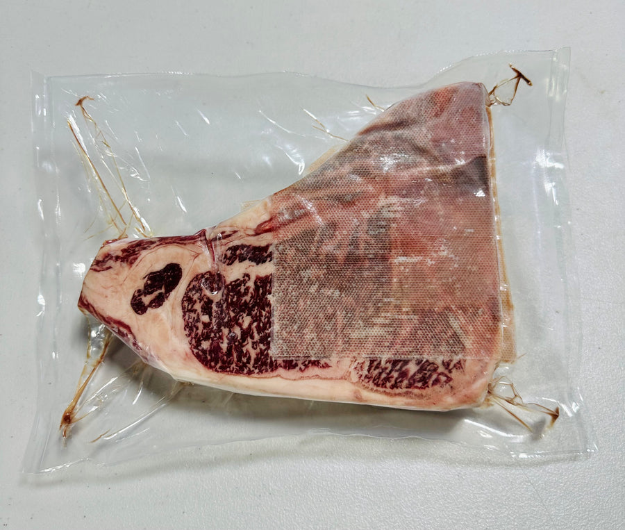 Stone Axe Australian Wagyu T-Bone Steak MS 9+ with rich marbling.