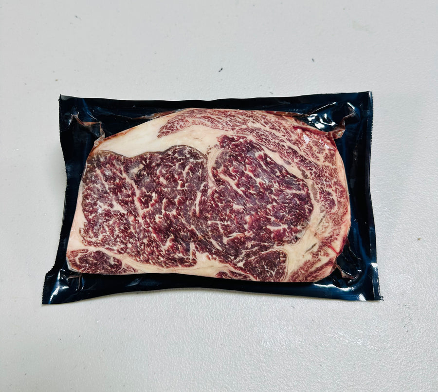 Juicy Australian Wagyu Boneless Ribeye Steak, 10-12oz. Richly marbled for a tender, flavorful experience.