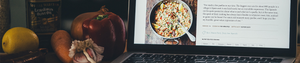 Image of cooking ingredients and tablet displaying recipe instructions.
